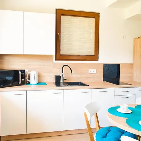 Promyki - Apartamentowe Ferienhaus Chłopy